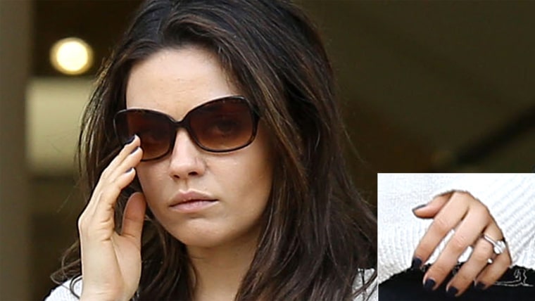 Mila Kunis wore an engagement ring on Thursday while shopping with her mother Elvira in Los Angeles.