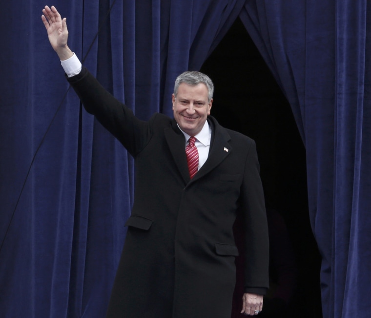 New York City Mayor Bill de Blasio arrives for his public inauguration at City Hall in New York on New Year's Day. He is one of several mayors whose first task in office will be dealing with Mother Nature's wrath.