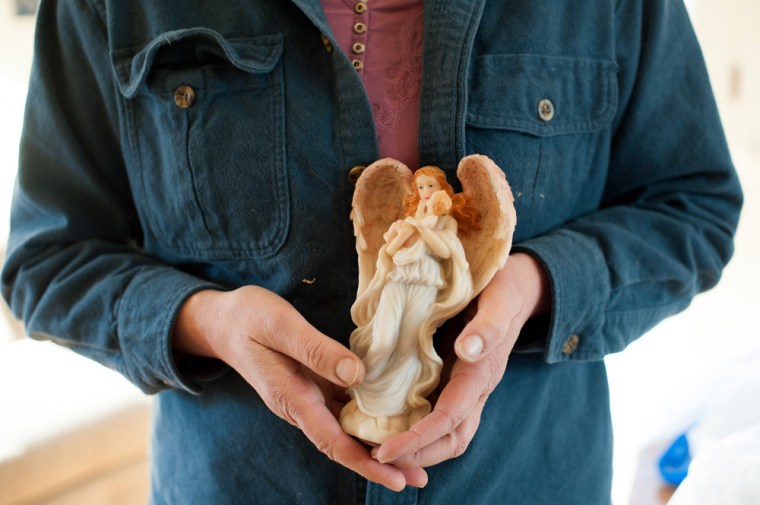 VeraMae Volk and her husband Eric Vaughn use their dining room table as an ebay center.