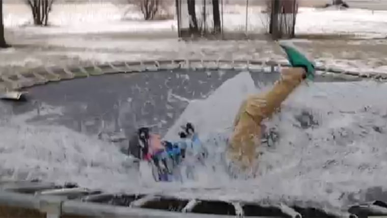 A Vine of jumping onto a frozen trampoline