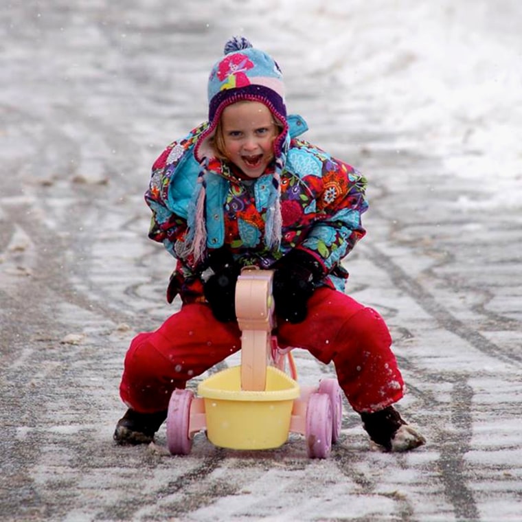 \"Our county says no cars on the road, so we've resorted to horseback,\" writes Carolyn Higgins Savage of daughter Mary Kate, 5.