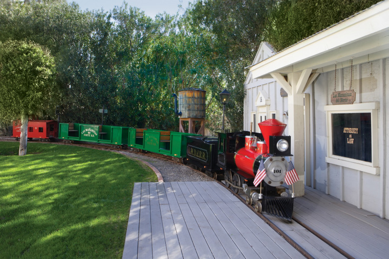 This Phoenix property features a 15-passenger train that runs around the entire grounds.