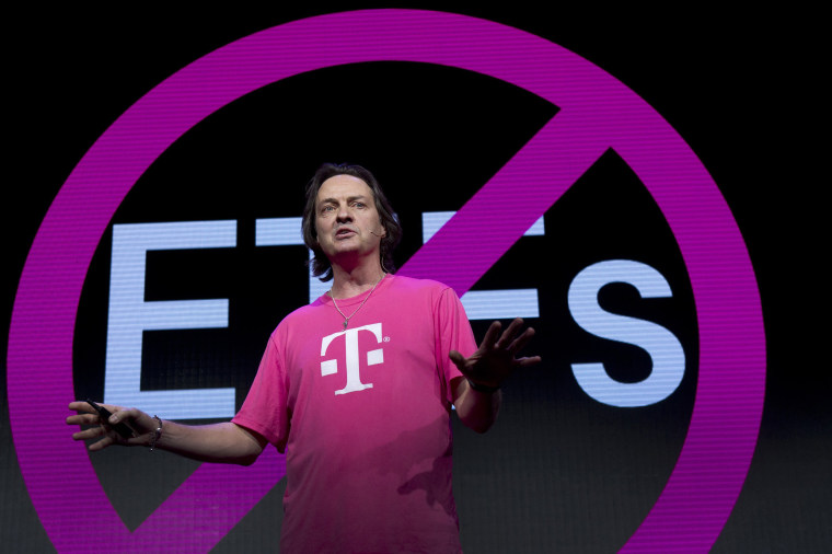 T-Mobile CEO John Legere speaks during a news conference at the 2014 International Consumer Electronics Show (CES) in Las Vegas.