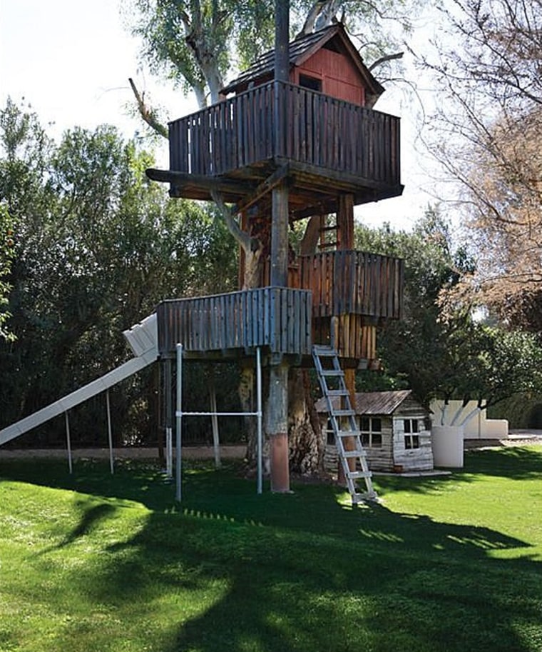 The previous owners built a three-story treehouse on the grounds of this Phoenix property.