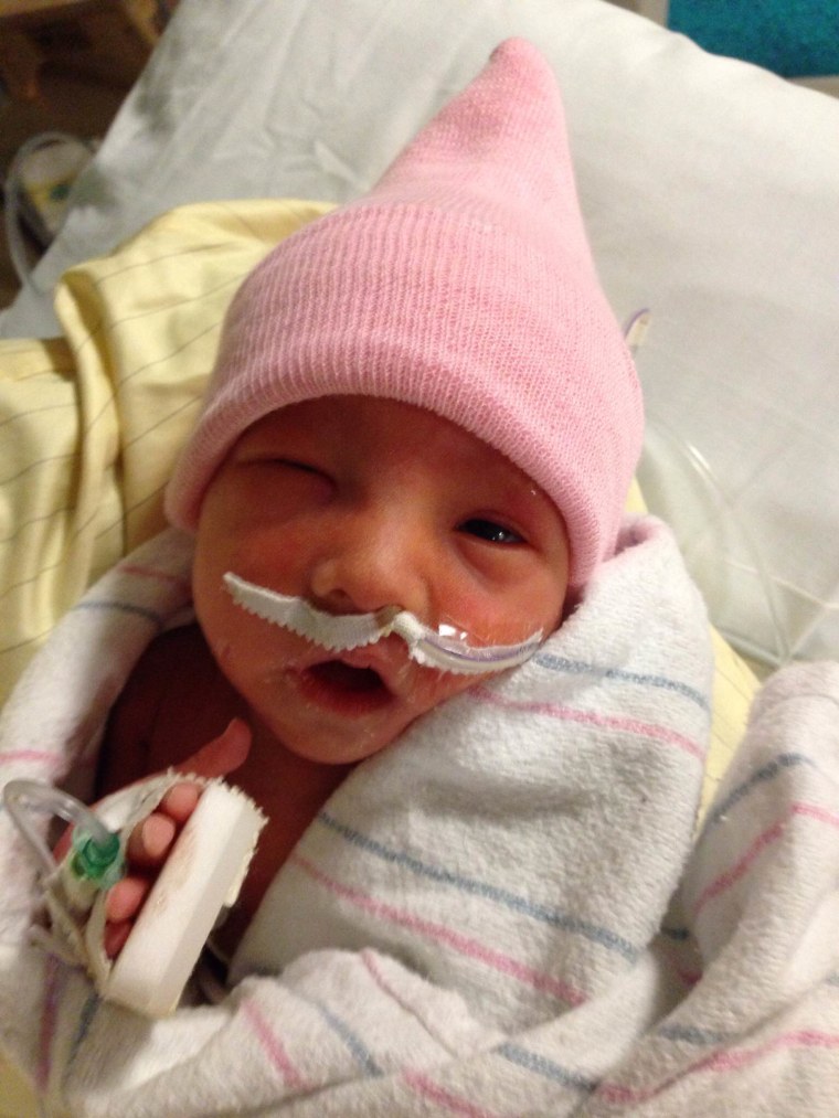Hello, world: Bentley Doss, one of three identical girl triplets born Dec. 30 after her dad reversed his vasectomy.