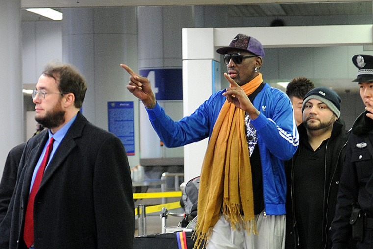 Dennis Rodman arrives at Beijing International Airport from North Korea on Monday.