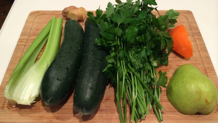 The fix-ins: Celery, cucumber, parsley, orange, pear, and ginger.