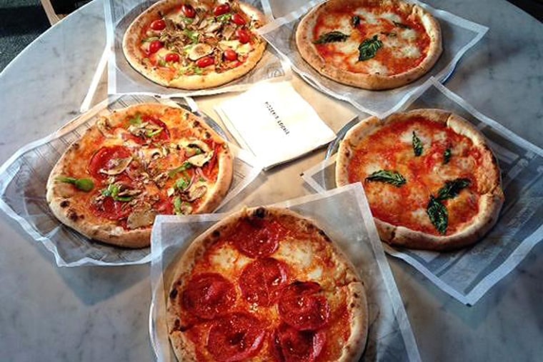 The artisanal pizza business is on an upswing. A visual sampling of the fare at Pizzeria Locale is seen here in Denver, Colo.