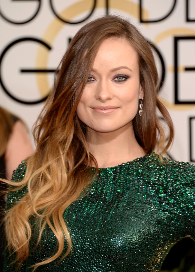 BEVERLY HILLS, CA - JANUARY 12:  Actress Olivia Wilde attends the 71st Annual Golden Globe Awards held at The Beverly Hilton Hotel on January 12, 2014...