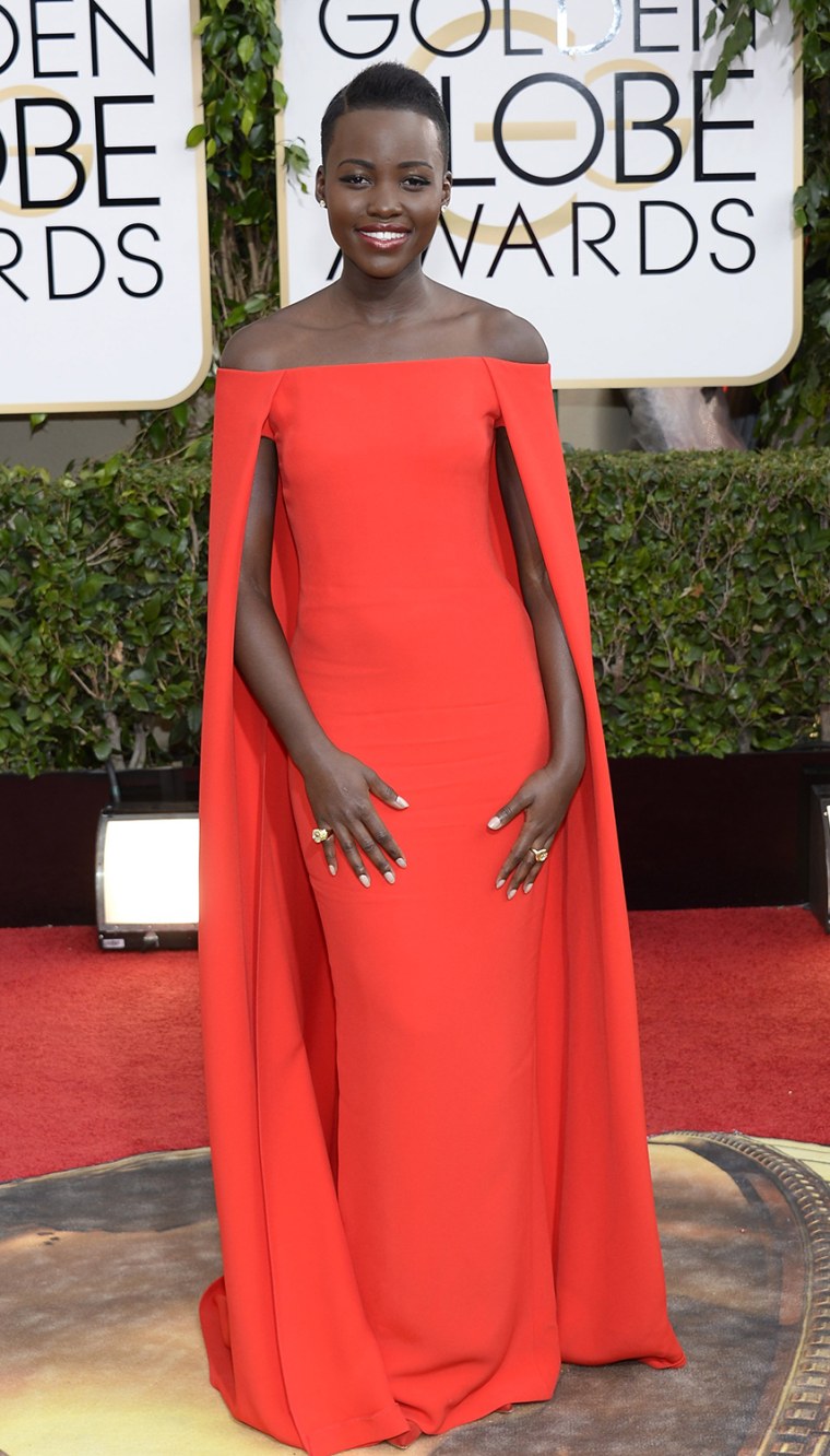 BEVERLY HILLS, CA - JANUARY 12:  71st ANNUAL GOLDEN GLOBE AWARDS -- Pictured: Actress Lupita Nyong'o arrives to the 71st Annual Golden Globe Awards he...