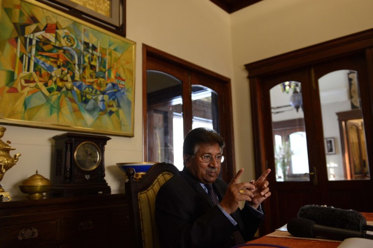 Pakistan's former military ruler Pervez Musharraf answers a question from foreign media representatives at his farmhouse in Islamabad on December 29, 2013. Musharraf denounced treason charges against him as a