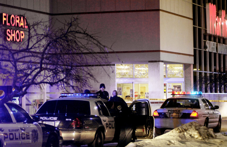 Emergency personnel respond to a shooting inside Martin's Supermarket in Elkhart, Ind., late Wednesday.