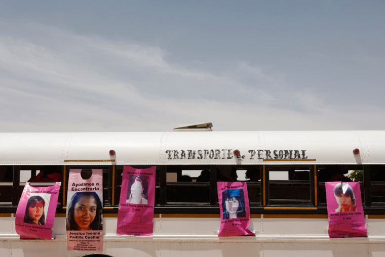 A bus is pasted with posters with pictures of women who went missing during the burial ceremony of Brenda Berenice Castillo near Ciudad Juarez, Mexico, on June 8. Brenda's remains were found in February 2012 and forensic experts confirmed that she had been killed approximately a year earlier.