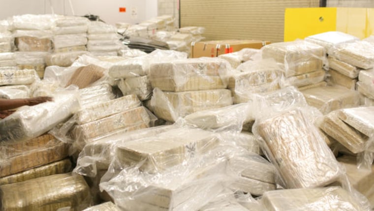 Police discovered about 12 tons of marijuana worth more than $7 million hidden inside a tractor-trailer in Orange County.