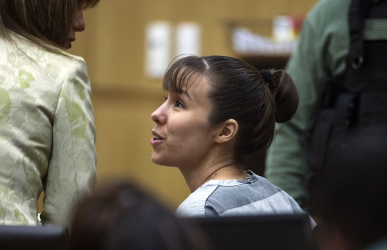 Jodi Arias talks with her defense attorney, Jennifer Wilmott, left, during a hearing on Tuesday, July 16, 2013, in Maricopa County Superior Court in Phoenix.