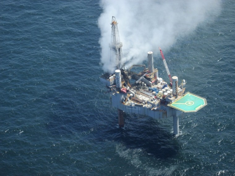 This photo released by the Bureau of Safety and Environmental Enforcement shows natural gas spewing from the Hercules 265 drilling rig in the Gulf of Mexico off the coast of Louisiana, Tuesday, July 23, 2013.