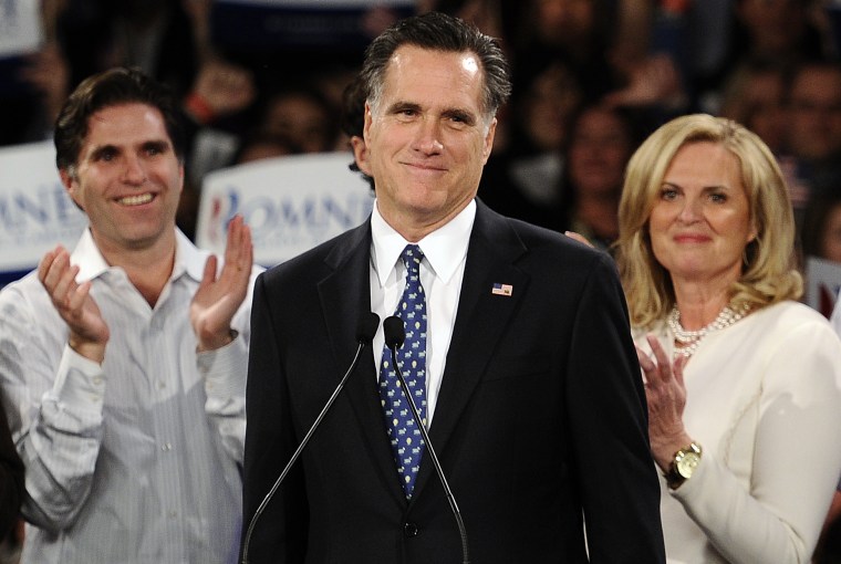Mitt Romney, with his son Tagg at left and his wife, Ann, at right, addresses supporters in Manchester on Jan. 10, 2012 after winning New Hampshire's primary.