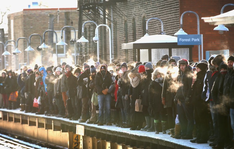 Chicago commuters wait for the train in sub-zero temperatures on Jan. 7.