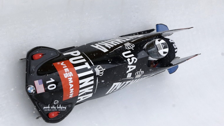 The United States' Jamie Greubel, left, and brakeman Lolo Jones compete in the women's bobsledding World Cup event Saturday, Dec. 7, 2013, in Park Cit...