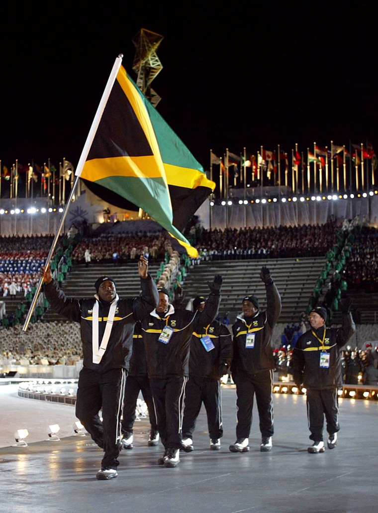 Winston Watts, shown leading the Jamaican delegation at the 2002 Olympics, helped spearhead a push to get the bobsled team from the island nation back in the Olympics for the first time in 12 years.