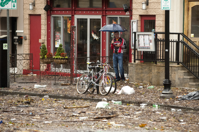 A man surveys the damage from Hurricane Sandy on Oct. 30, 2012 in Hoboken, N.J.