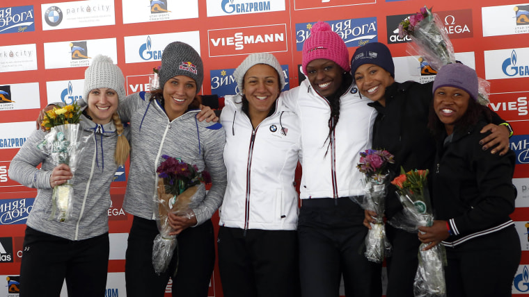Dec 7, 2013; Park City, UT, USA; From left, tied for second place finishers Jamie Greubel and Lolo Jones of the United States, first place finishers E...