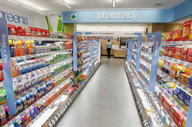 Cold and flu products are pictured on shelving during a private cocktail event celebrating the grand opening of drugstore chain Walgreens newest flags...