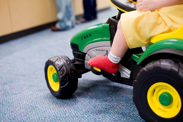 Sometimes, kids are so excited about riding a pedal car (or tractor) through the hospital, they forget to be scared about their surgery.