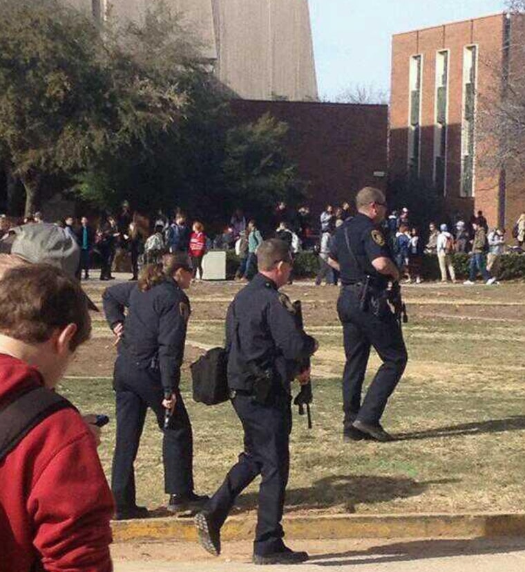 Police search the University of Oklahoma after a shooting scare.