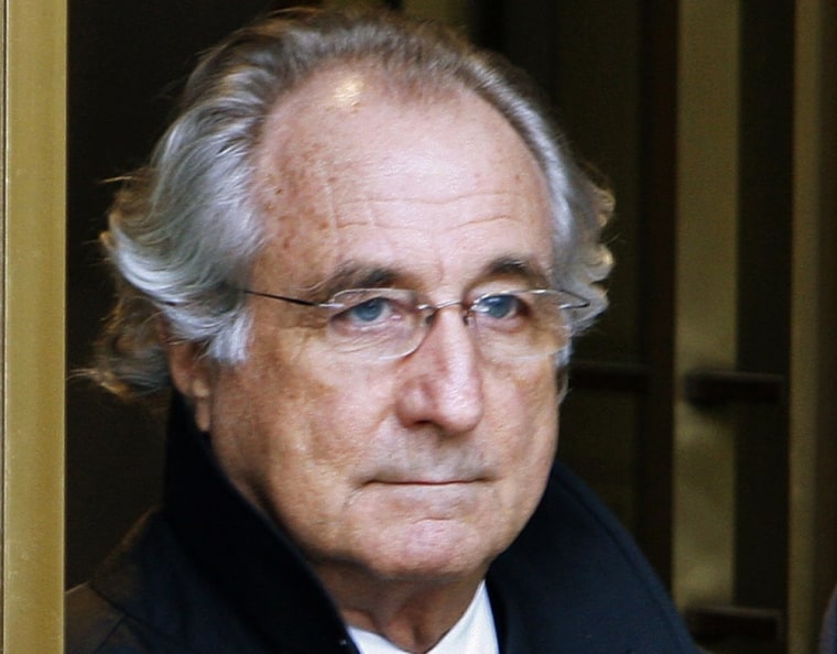 Ponzi scammer Bernard Madoff, shown here in this 2009 file photo, is back in prison after being hospitalized last month for a heart attack.