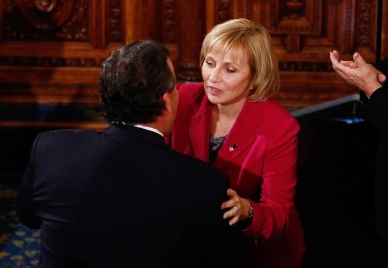 New Jersey Lt. Gov. Kim Guadagno greets Gov. Chris Christie before his State of the State Address in Trenton on Jan. 14