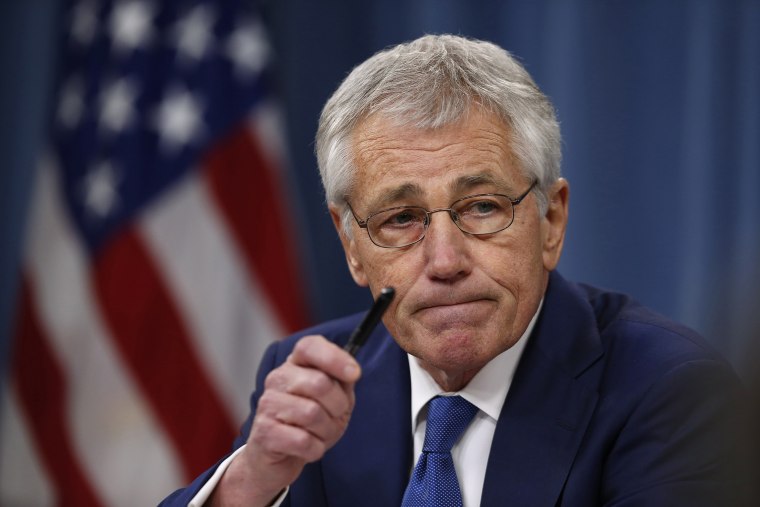 Defense Secretary Chuck Hagel takes questions as he briefs reporters at the Pentagon in Washington on Dec. 19, 2013.