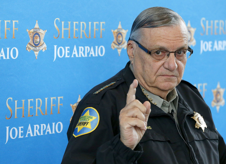 Maricopa County Sheriff Joe Arpaio, seen here at a December news conference, says 38 inmates at the jail have desecrated American flags.