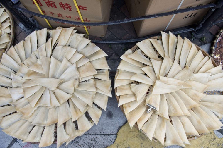 Shark fins are laid out to dry on a street corner in Hong Kong on Jan. 4, 2014. Shark fin soup has long been a luxury enjoyed by China's wealthy, but thanks to a crackdown on official extravagance, its consumption is down.