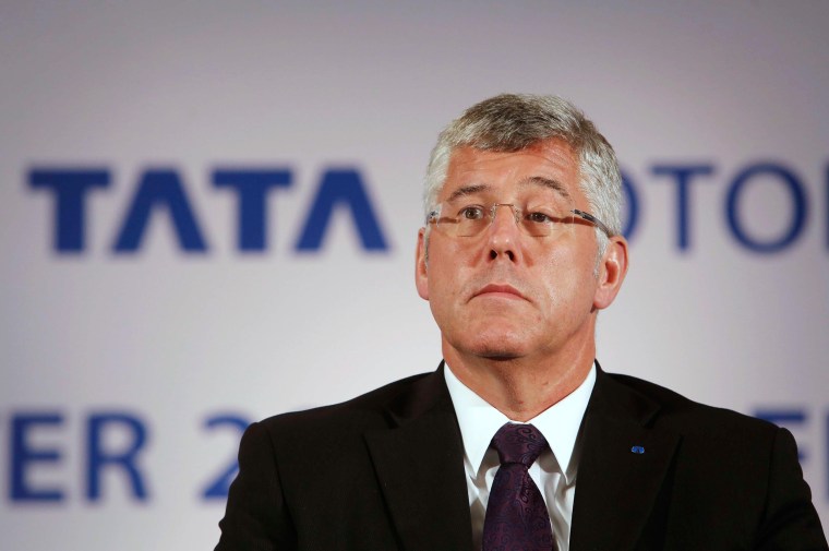 Karl Slym, managing director of Tata Motors, looks on during a news conference to announce their second quarter results in Mumbai November 8, 2013.