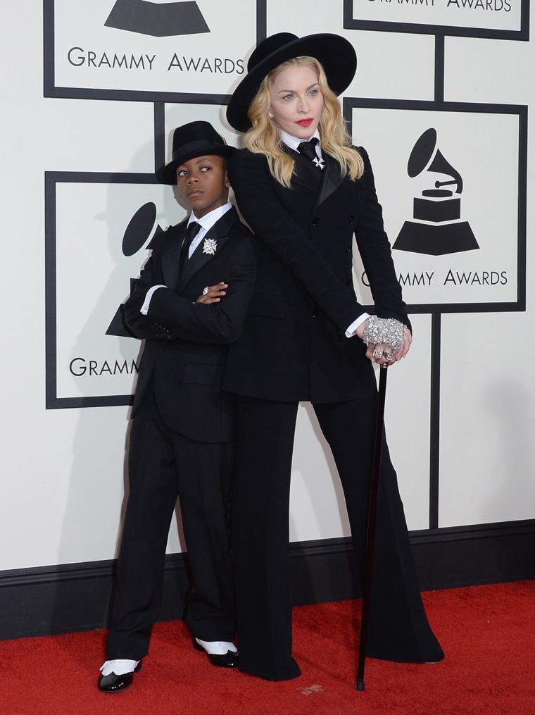 LOS ANGELES, CA - JANUARY 26:  Singer Madonna (R) and son David Banda Mwale Ciccone Ritchie attend the 56th GRAMMY Awards at Staples Center on January...