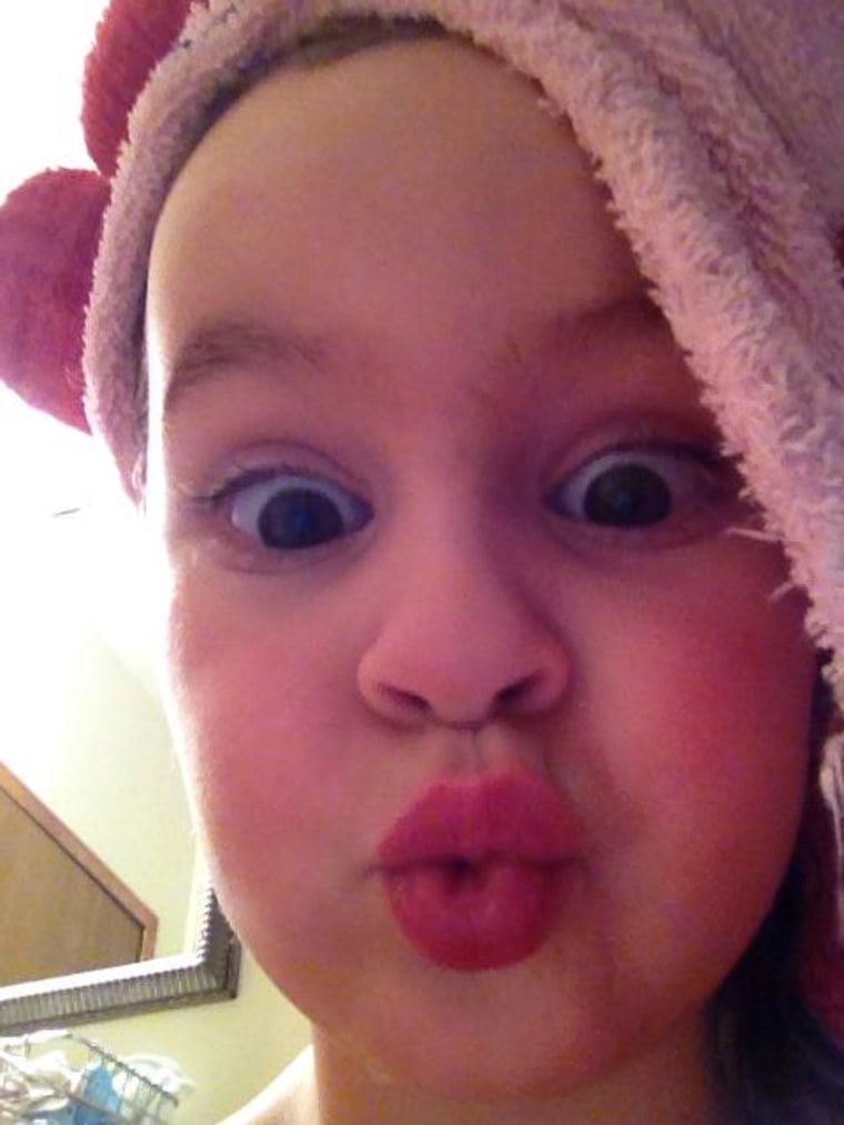 My 4 year old doing the duck face after her bath.