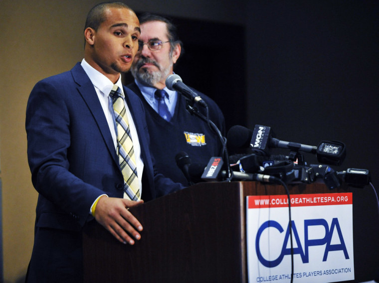 Leo W. Gerard, president of the Steelworkers, (right) and Northwestern quarterback Kain Colter answer questions at a press conference Jan. 28 at The Hyatt Regency Hotel in Chicago. Citing what they deem as the NCAA's abdication of responsibility to protect athletes from injury, the College Athletes Association announced the creation of the new labor organization to represent college football and basketball players. (Photo by David Banks/Getty Images)