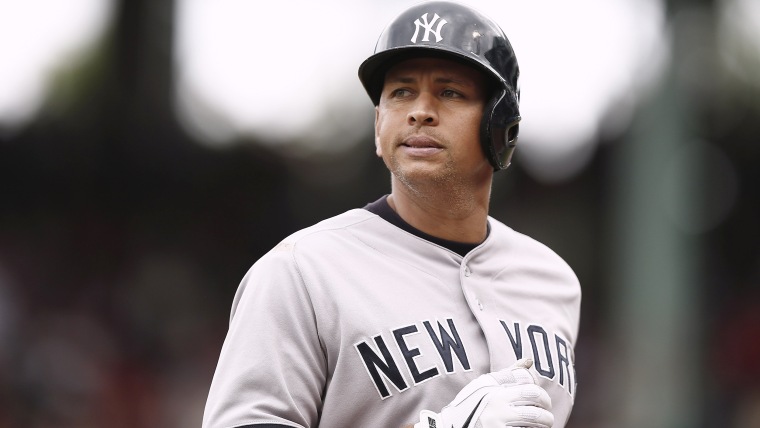 FILE - In this Sept. 14, 2013 file photo, New York Yankees' Alex Rodriguez heads to the dugout during the Yankees 5-1 loss to the Boston Red Sox  in a...