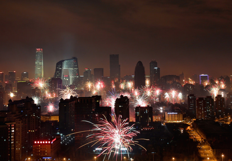 Fireworks illuminate the Beijing skyline in 2013, but Friday's Chinese Lunar New Year celebrations could be curtailed because of smog, officials have warned.