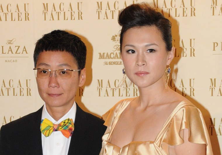 Gigi Chao (R), the daughter of Hong Kong tycoon Cecil Chao Sze-tsung, with her partner Sean Eav in 2011.