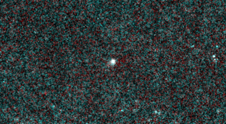 NASA's NEOWISE mission captured images of comet C/2013 A1 Siding Spring, which is slated to make a close pass by Mars on Oct. 19, 2014. The infrared pictures reveal a comet that is active and very dusty even though it was about 355 million miles (571 million kilometers) away from the sun on Jan. 16, 2014, when this picture was taken.