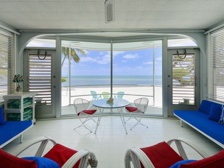 The view is great from this houseboat-turned-beachside residence.