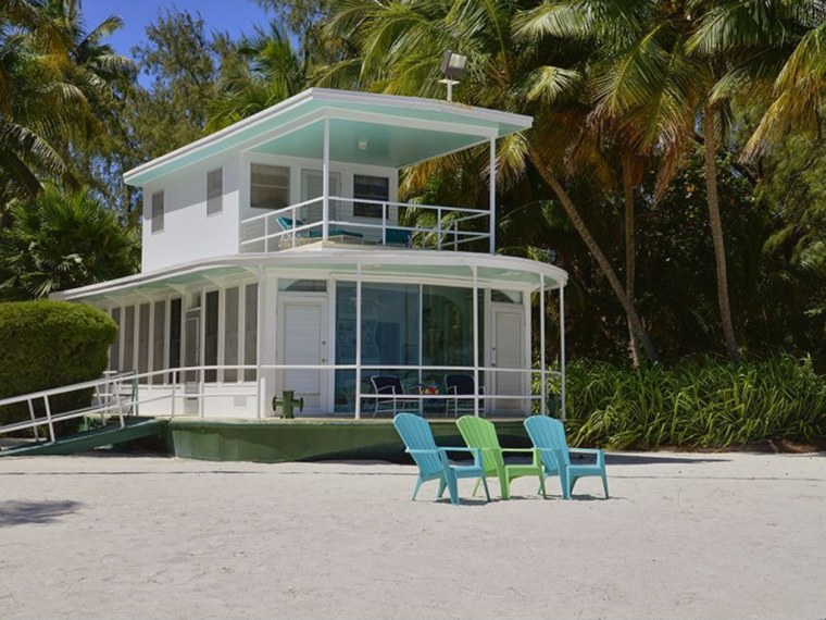 The houseboat comes with its own stretch of sandy beach near Islamorada.