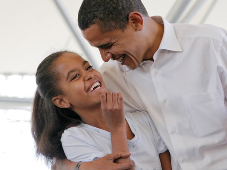 Malia Obama and Barack Obama