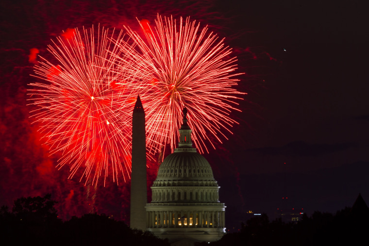 Fireworks illuminate the sky over the U.S. Capitol building and the Washington Monument during Fourth of July celebrations, on Friday, July 4, 2014, i...