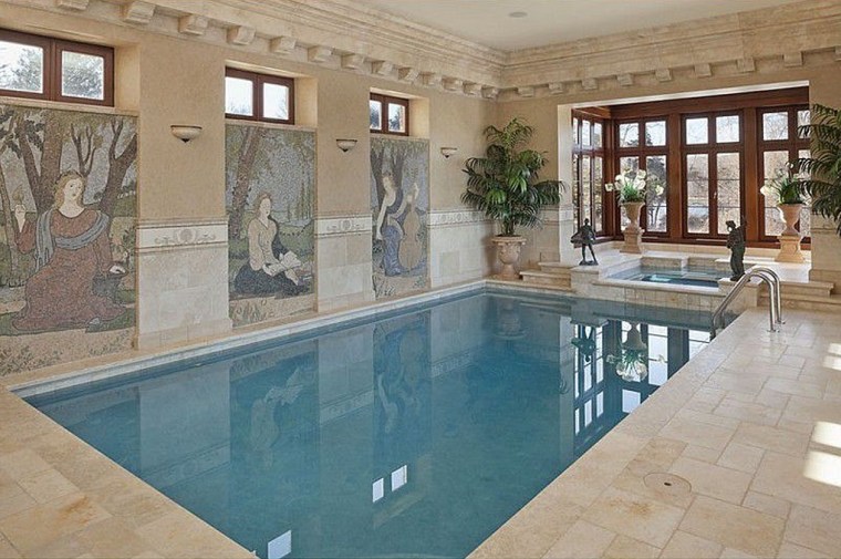 A large indoor pool and spa sit in the center of the home.
