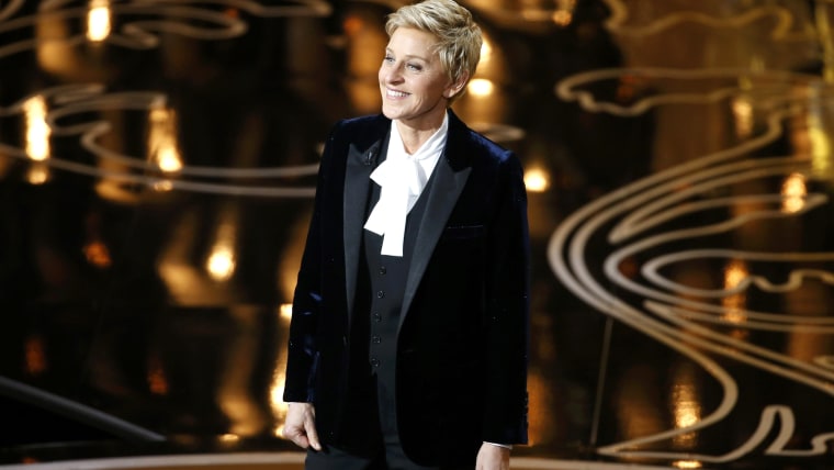 Ellen Degeneres takes the stage to host the show at the start of the 86th Academy Awards in Hollywood, California March 2, 2014.    REUTERS/Lucy Nicho...