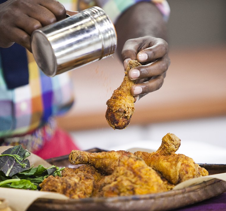 Marcus Samuelsson and Willie Geist go over how to make fried chicken on the TODAY show in New York, on July 9, 2014.