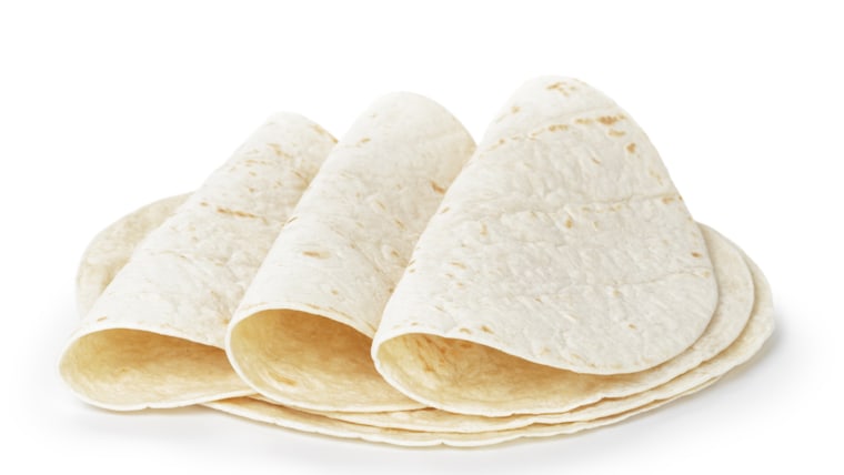 wheat round tortillas, isolated on white background; Shutterstock ID 175742816; PO: today.com